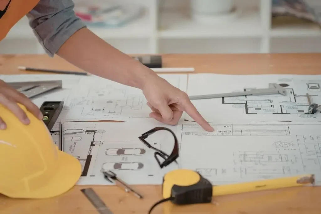 engineer reviewing building plans